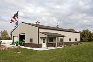 Barn with Flag and Tractor