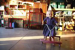 Kid riding a tricycle