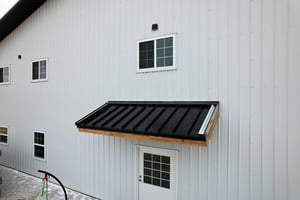 Standing seam overhang